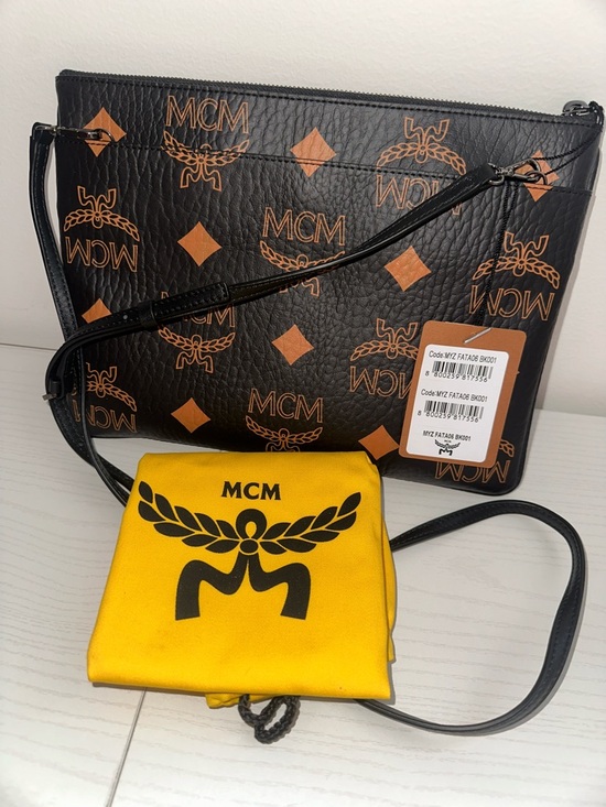 MCM Handbags - NWT MCM Black & Cognac Logo Aren Crossbody pouch in monogram letter